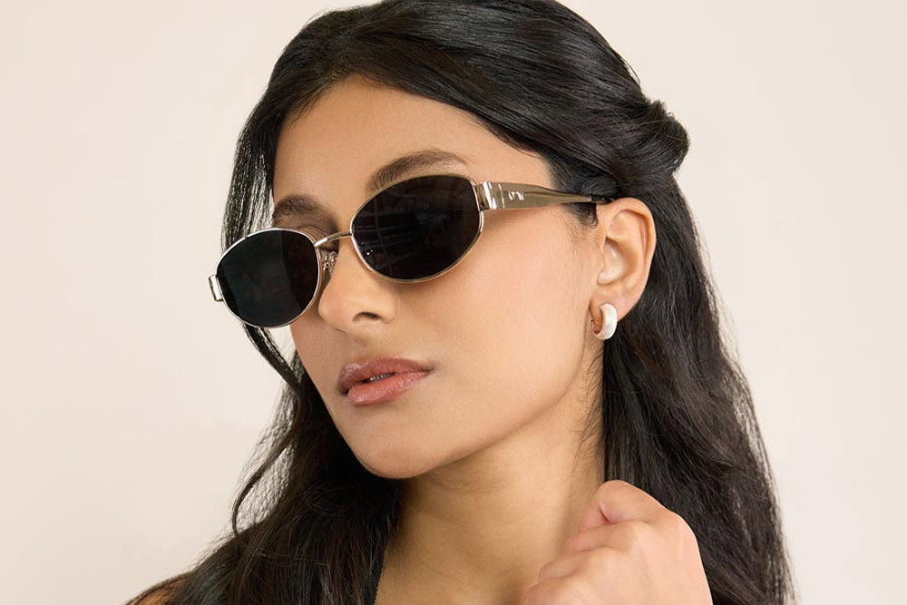 Cruz sunglasses bio-acetate frames worn by model.