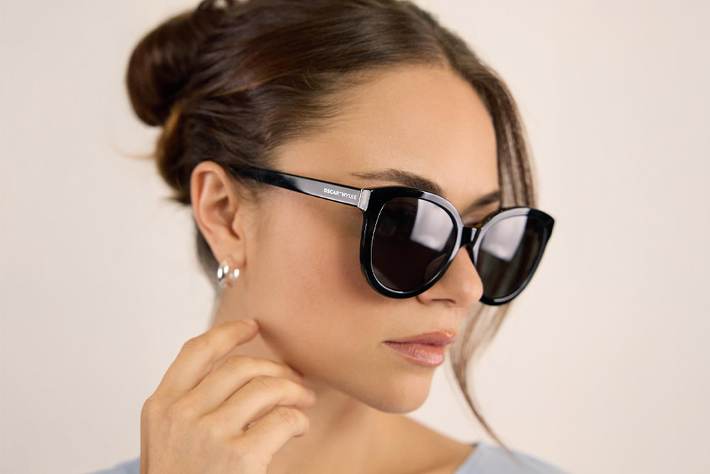 Laura sunglasses bio-acetate frames worn by model.