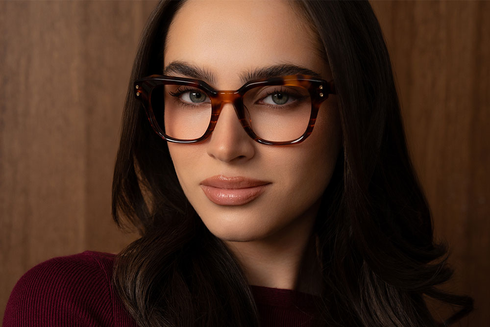 Model wearing Oscar Wylee Gina acetate optical frames.
