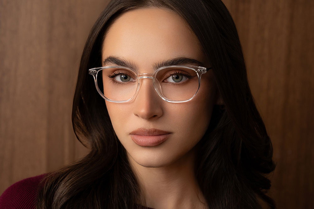 Model wearing Oscar Wylee Lori TR90 and metal optical frames.