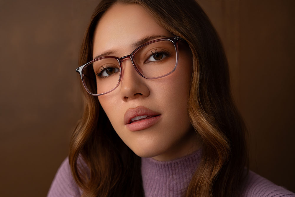 Model wearing Oscar Wylee Vista TR90 optical frames.
