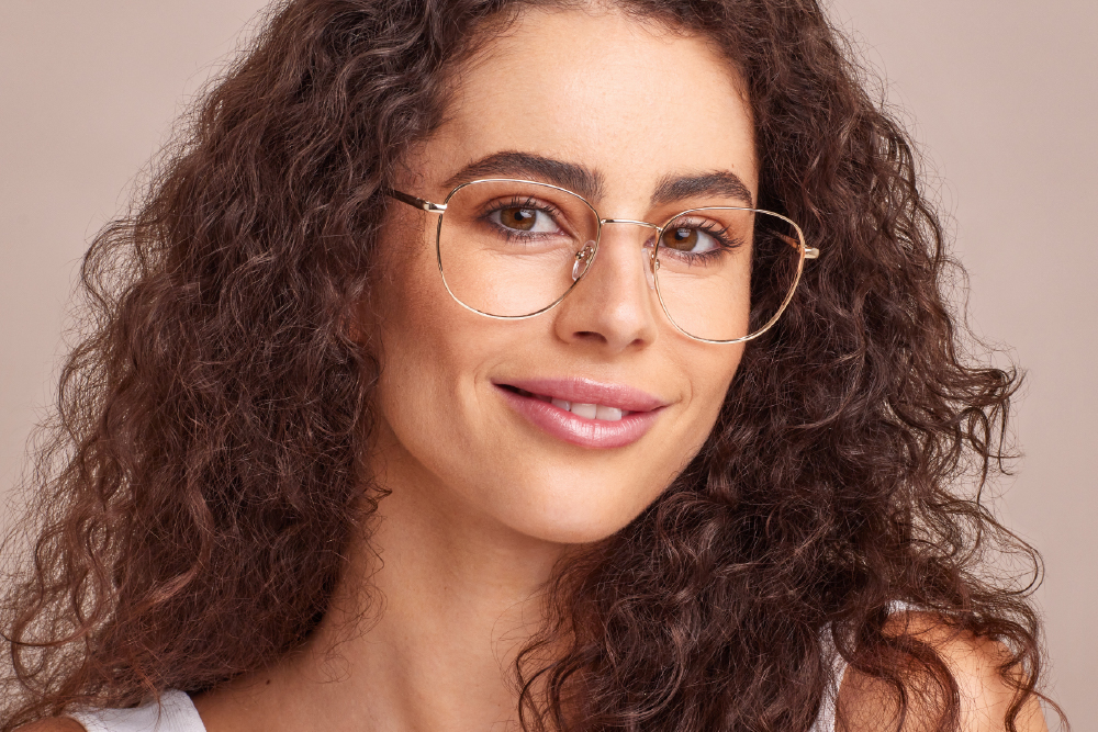 Micah Stainless Steel eyeglasses frame worn by model.