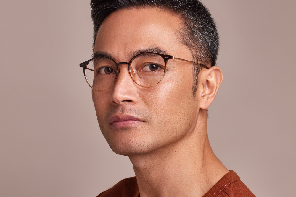 Alya TR/Ultem material eyeglasses frame worn by model.
