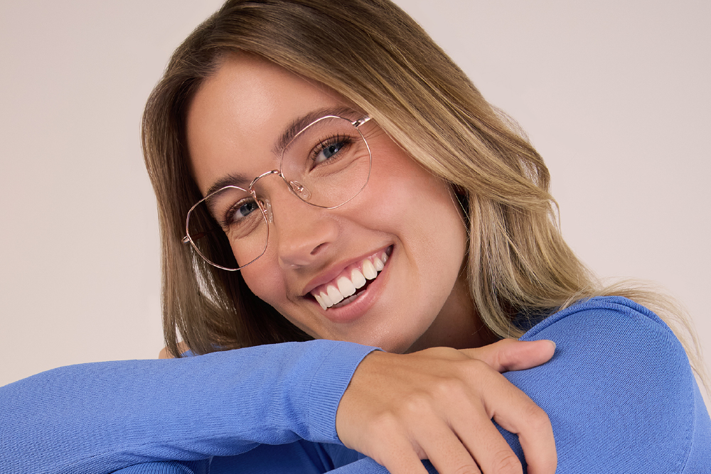 Soma Stainless Steel eyeglasses frame worn by model.