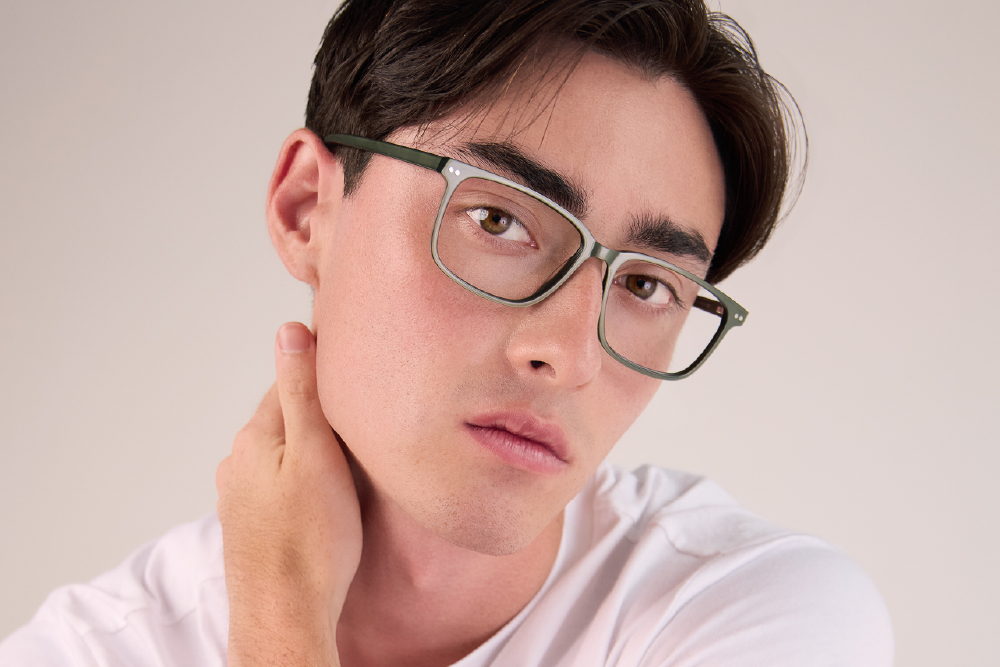 AndrewAcetate eyeglasses frame worn by model.
