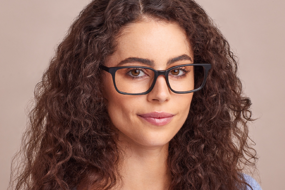 Cape Acetate eyeglasses frame worn by model.