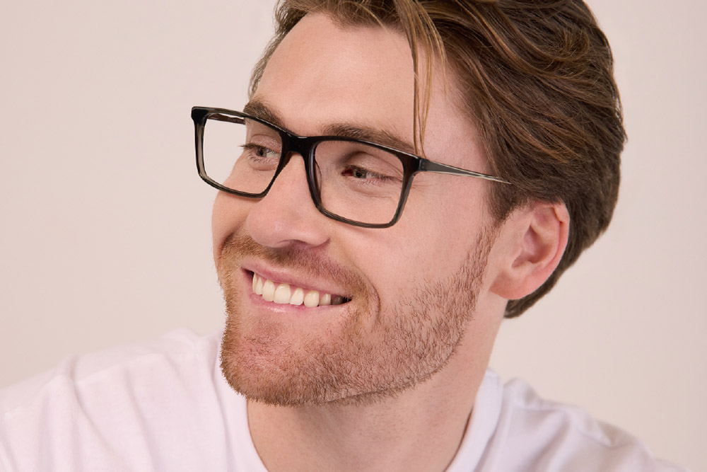 Dom Acetate eyeglasses frame worn by model.