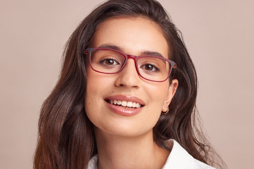 Miles TR/Ultem Material eyeglasses frame worn by model.