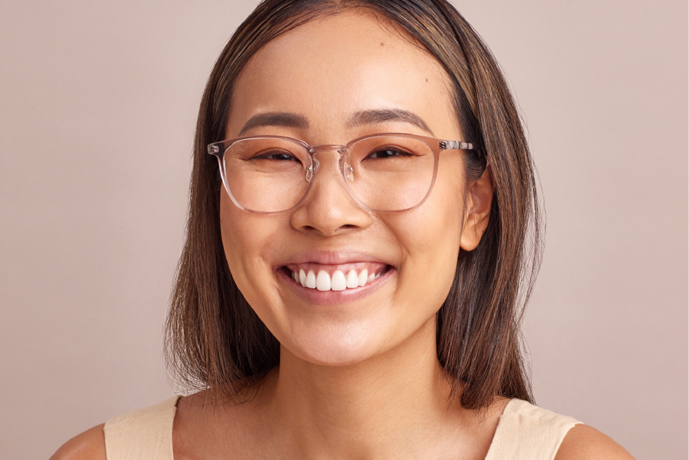 Finney eyeglasses frame worn by model.