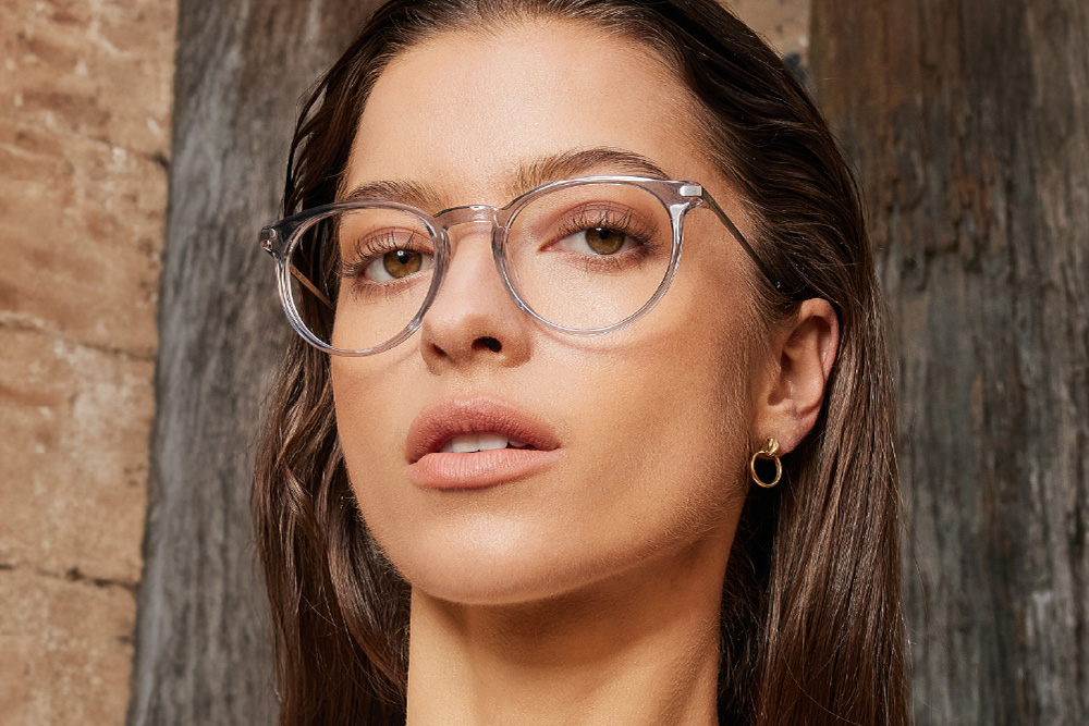 Dolly eyeglasses frame worn by model.