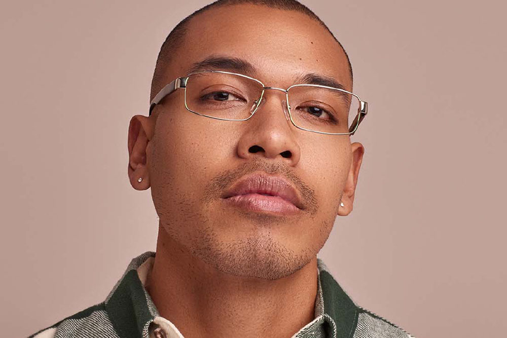 Brody eyeglasses frame worn by model.