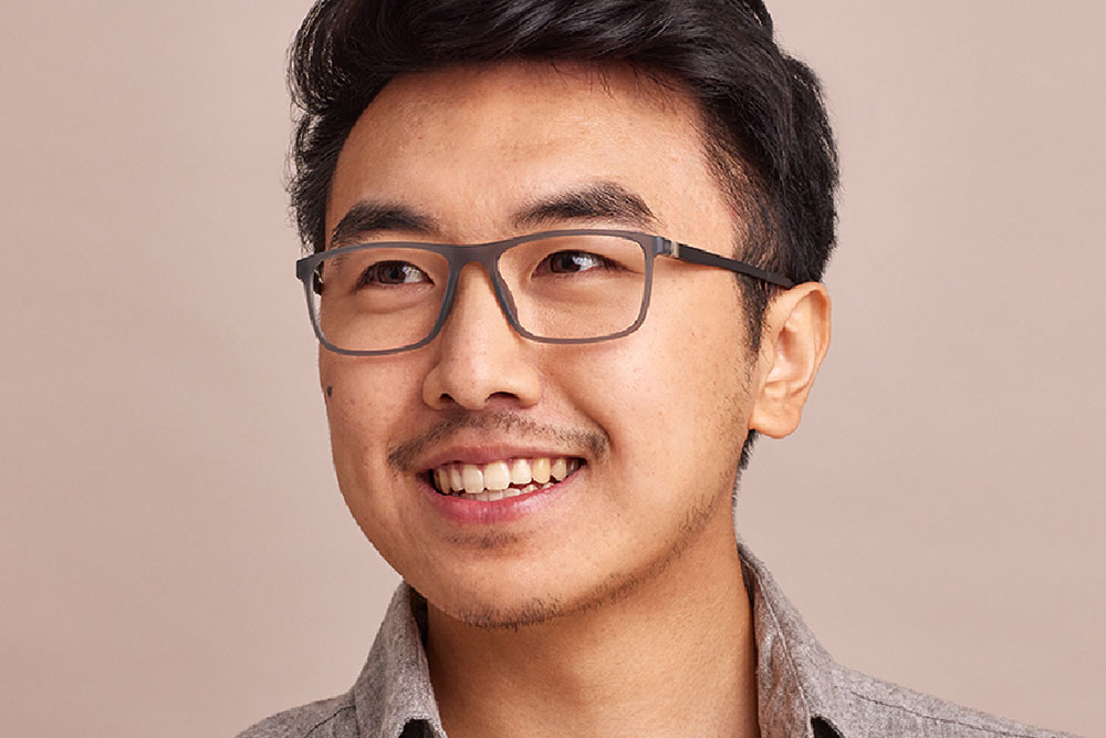 Logan eyeglasses frame worn by model.