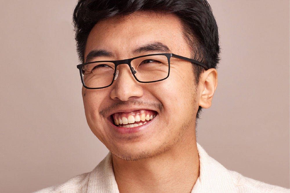 Bishop eyeglasses frame worn by model.