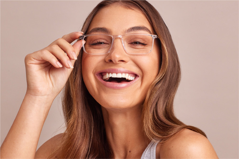 Brosque eyeglasses frame worn by model.
