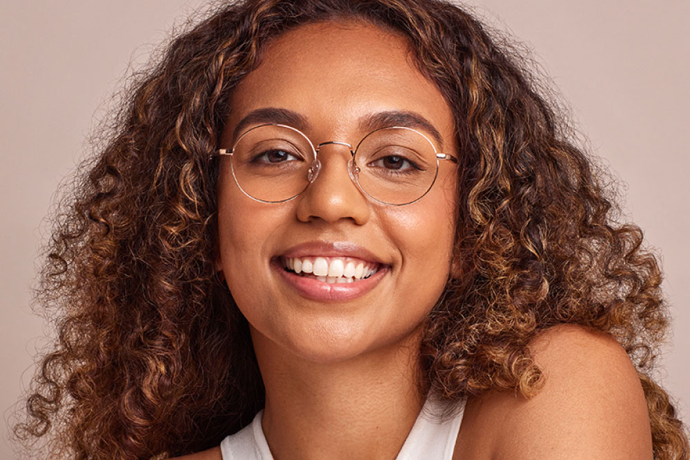 Haskell eyeglasses frame worn by model.