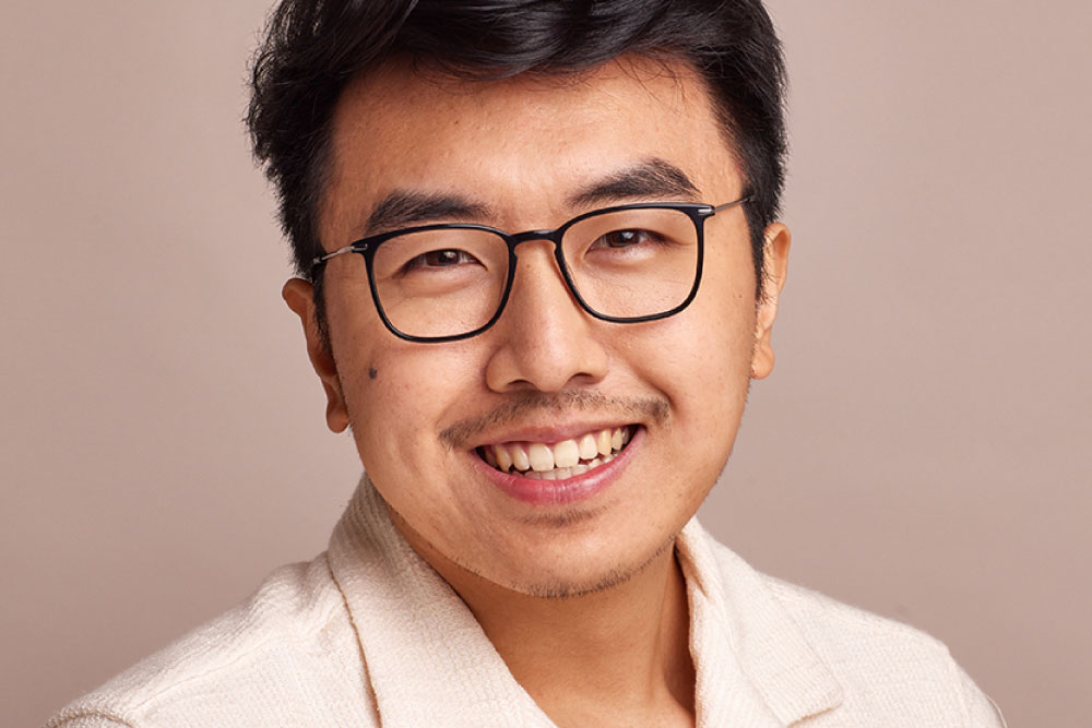 Holden eyeglasses frame worn by model.