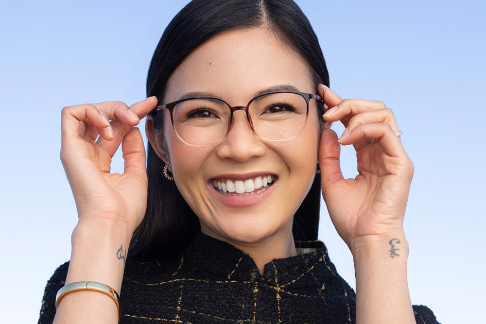 Amanda Ultem material eyeglasses frame worn by model.