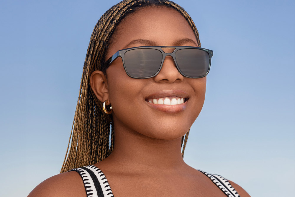 Baz Acetate eyeglasses frame worn by model.