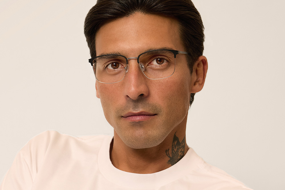 Marvin eyeglasses frame worn by model.